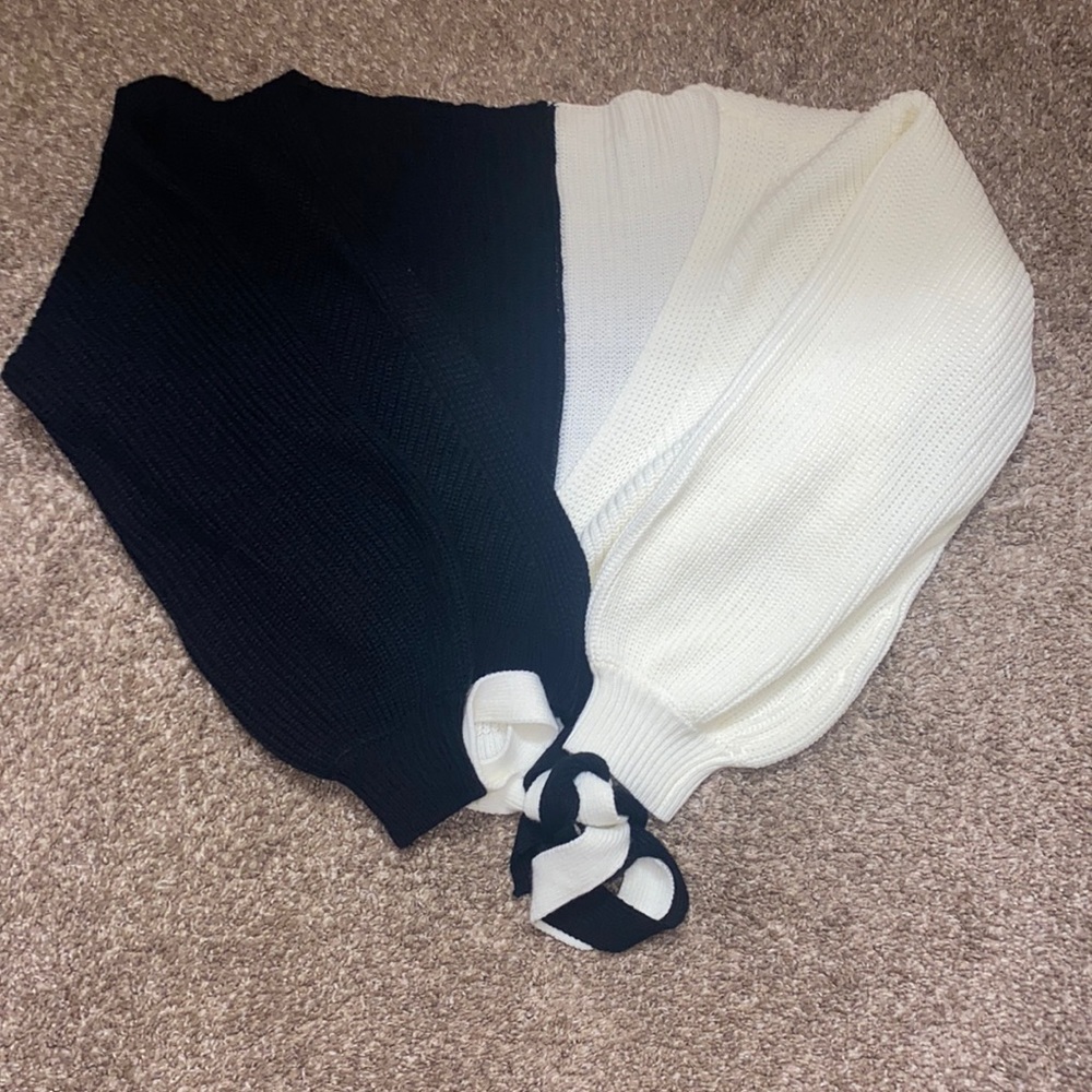 Black and white sweater with ties